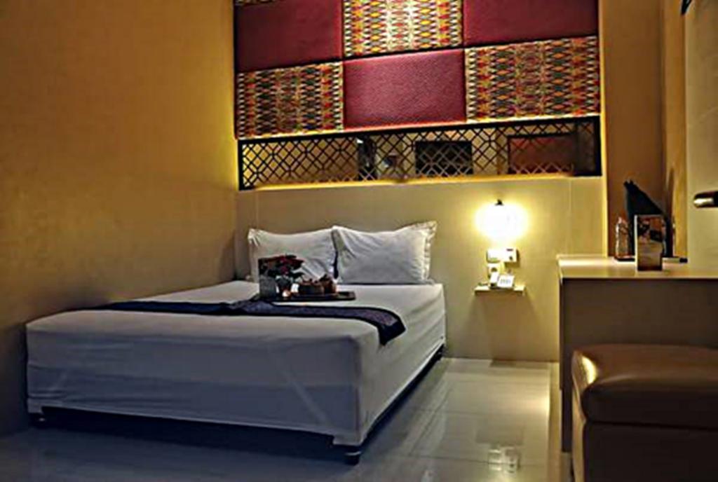 Hotel Metro House Surabaya Zimmer foto